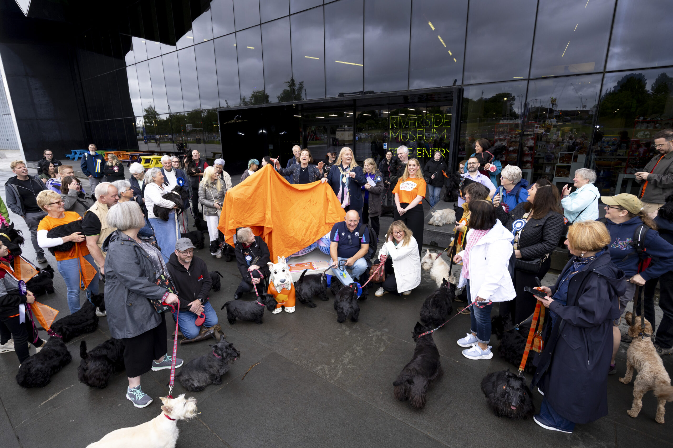 Winners of Scotties art competition gather in Glasgow